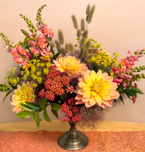 A beautiful compote full of late summer blooms such as, snap dragons, cottage yarrow, dahlias, dill, bunnytail grass, ruscus, and dried smokebush.